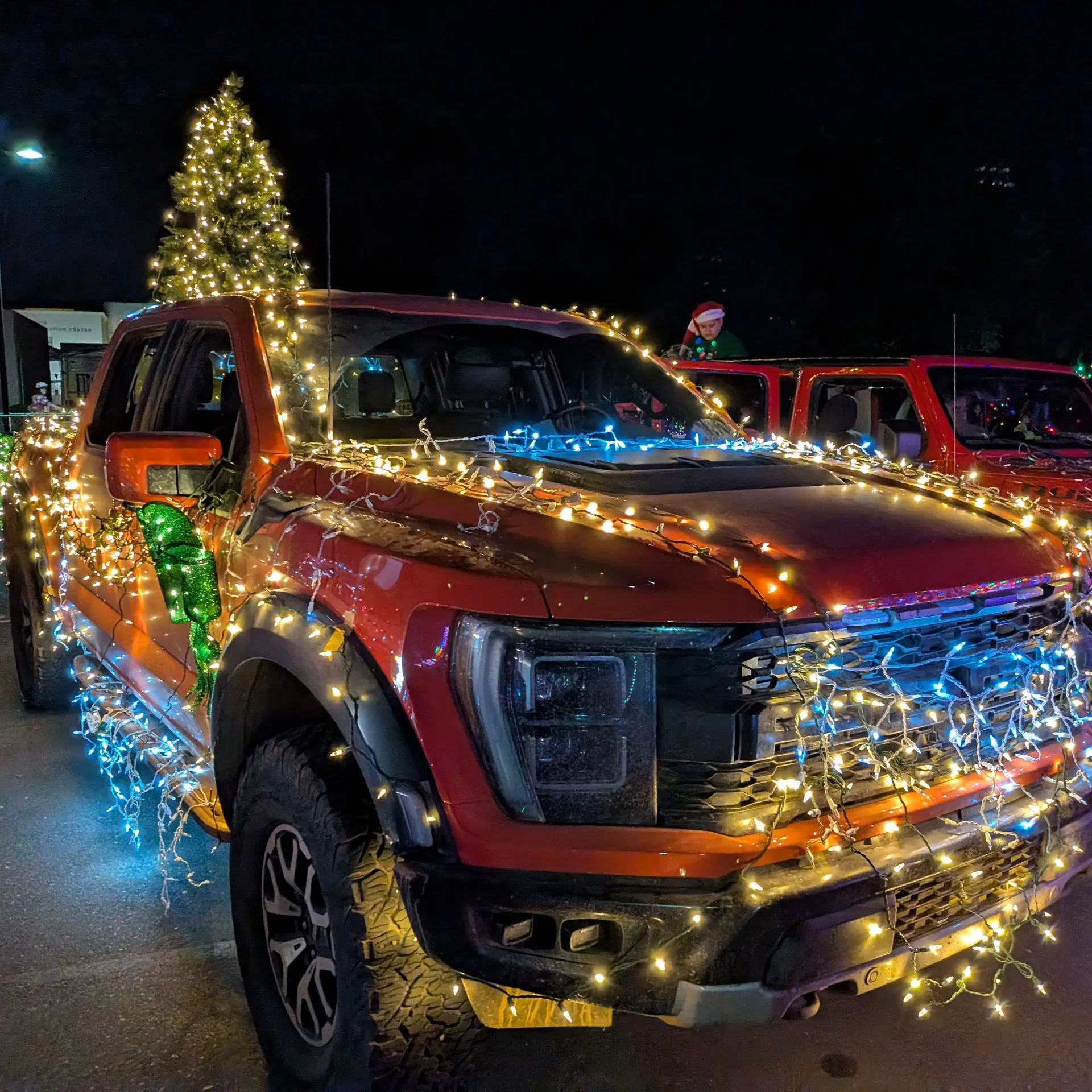Decorating vehicles for the Chandler Parade of Lights 2024 Vehicles decorated for the Chandler Parade Of Lights 2024.